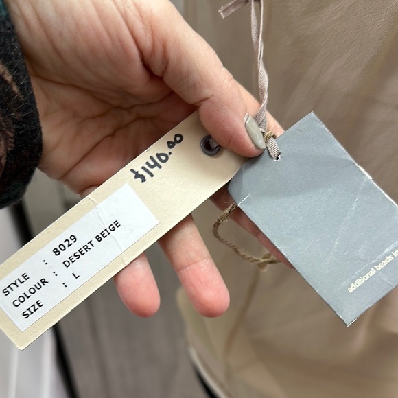 Saivana White Tank Top with Bib Collar and Asymmetrical Cut Out Design - Picture 2 of 8